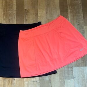 TWO SZ LG skorts. Bright peach Nike drifit and navy Skechers. Excellent shape!